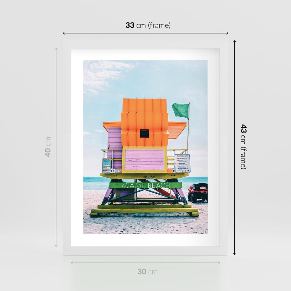 Plakat w ramie 30x40 - Plaża Miami w Słoneczny Dzień - domek ratownika, kolorowy - rama biała