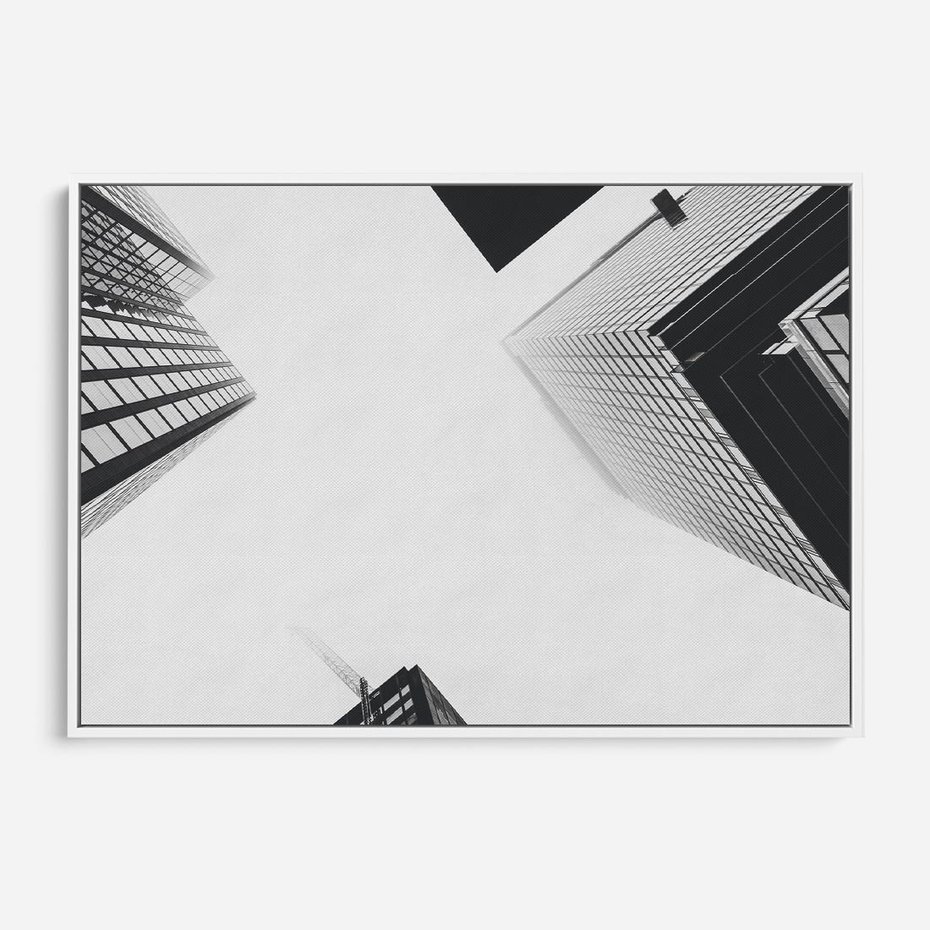 Obraz w ramie 100x70 - Nowoczesna Dynamika - perspektywa, wieżowce - rama biała