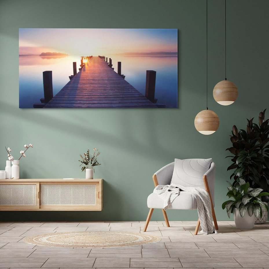 Obraz na płótnie 120x60 - Zachód słońca nad molo: Magia morza - molo, zachód słońca