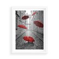Plakat w ramie 50x70 - Parasole w malowniczej uliczce - parasole, uliczka - rama biała