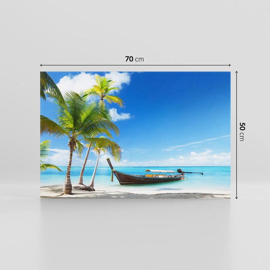 Obraz na płótnie 70x50 - Sielska plaża z łodzią na morzu - plaża, morze