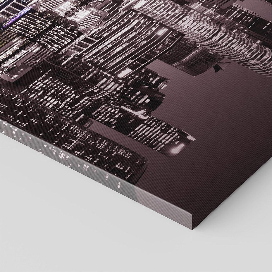 Obraz na płótnie 70x100 - Miejskie światła ożywiające nocne niebos - Singapur, miasto