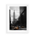 Plakat w ramie 50x70 - Nowy York, taksówka w ruchu - Nowy York, taksówka - rama biała