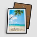 Plakat w ramie 50x70 - Hawajska palma i huśtawka na plaży - palma, huśtawka - rama czarna