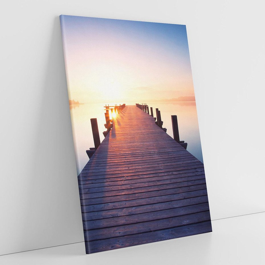 Obraz na płótnie 70x100 - Zachód słońca nad molo: Magia morza - molo, zachód słońca