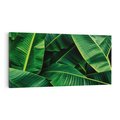 Obraz na płótnie 140x70 - Zaklęta roślinna ekspresja - liście bananowca, gęsto ułożone