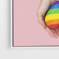 Obraz w ramie 50x50 - Miłość na Dłoniach - zdjęcie, dłonie trzymają ulepione tęczowe serce - rama biała