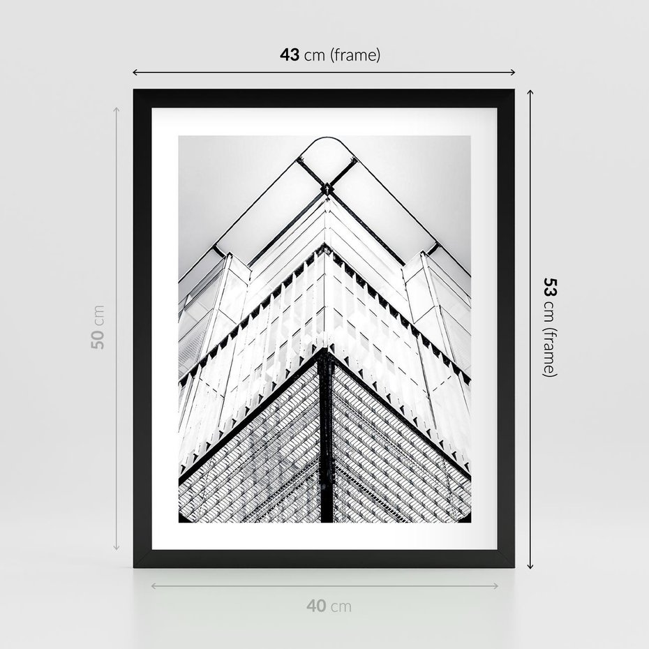 Plakat w ramie 40x50 - Elegancja Współczesnej Architektury: Wieżowiec w Monochromii - nowoczesna architektura, czarno biała fotografia - rama czarna