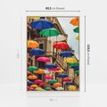 Obraz w ramie 80x120 - Barwna symfonia wyobraźni - fotografia, kolorowe parasolki podwieszone nad ulicą - rama drewno