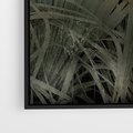 Obraz w ramie 50x70 - Światło w mroku duszy - liście traw, mroczny klimat - rama czarna