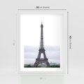 Plakat w ramie 30x40 - Eiffla w mglistym świetle - Eiffla, Paryż - rama biała
