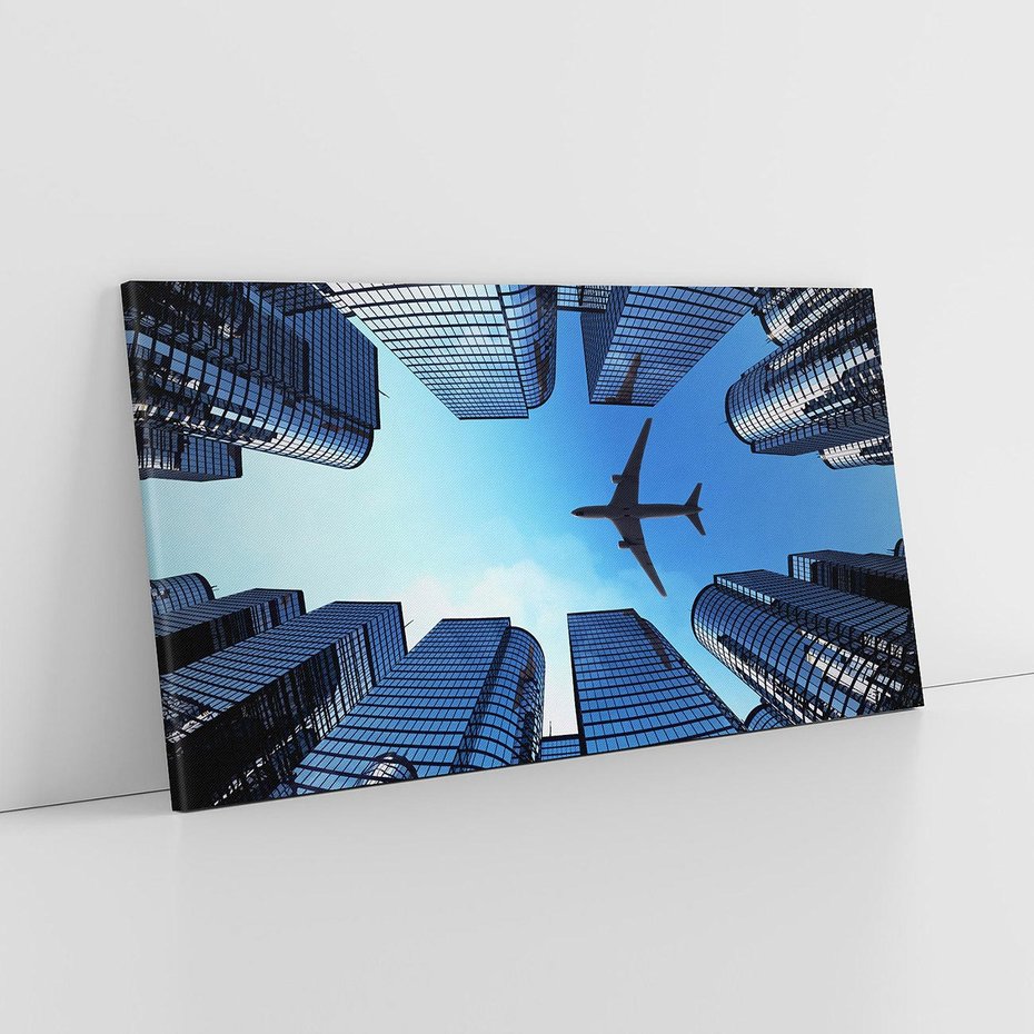 Obraz na płótnie 140x70 - Miasto o niezwykłym widoku - latające samoloty - miasto, samolot