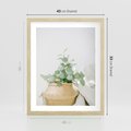 Plakat w ramie 40x50 - Eukaliptusowa Świeżość - eukaliptus, liście w koszu z wikliny - rama drewno