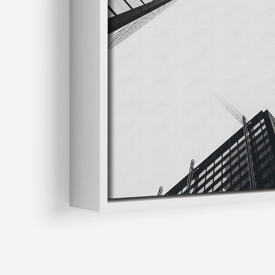 Obraz w ramie 80x80 - Nowoczesna Dynamika - perspektywa, wieżowce - rama biała