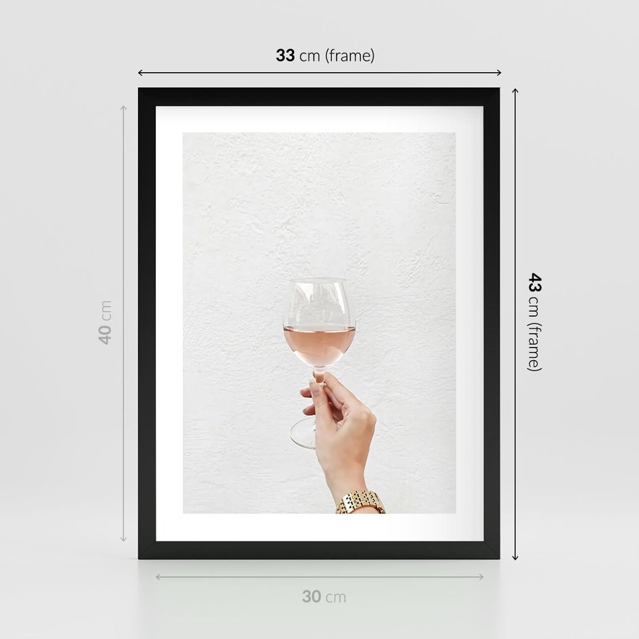 Plakat w ramie 30x40 - Kobieca Dłoń i Różowe Wino - kieliszek różowego wina, kobieca dłoń - rama czarna