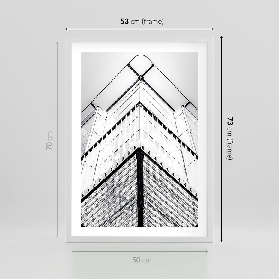 Plakat w ramie 50x70 - Elegancja Współczesnej Architektury: Wieżowiec w Monochromii - nowoczesna architektura, czarno biała fotografia - rama biała