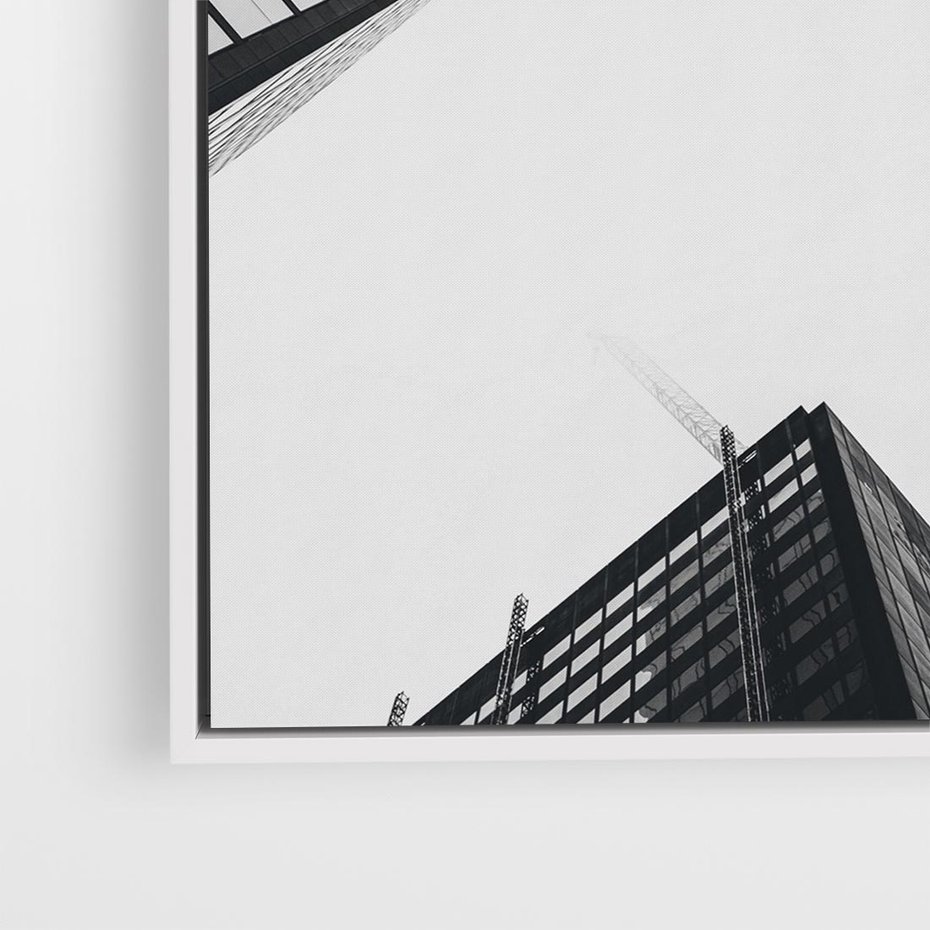 Obraz w ramie 50x50 - Nowoczesna Dynamika - perspektywa, wieżowce - rama biała
