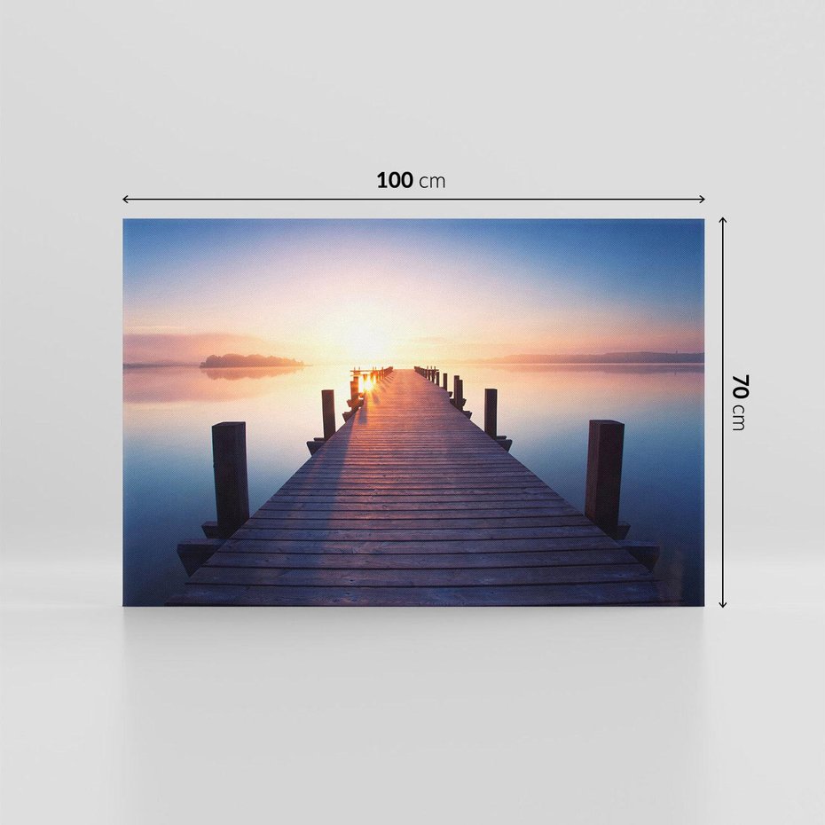 Obraz na płótnie 100x70 - Zachód słońca nad molo: Magia morza - molo, zachód słońca