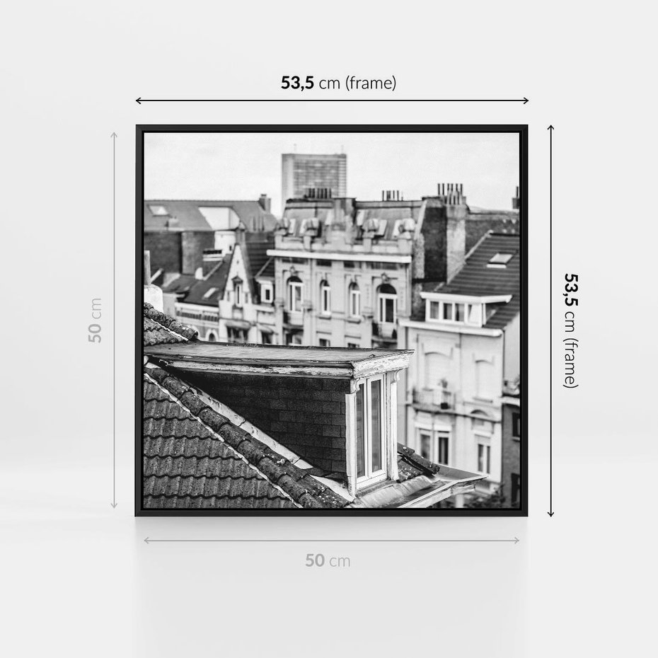 Obraz w ramie 50x50 - Miasto w Retro Odsłonie - fotografia czarno biała, ujęcie na dachy wielkiego miasta - rama czarna