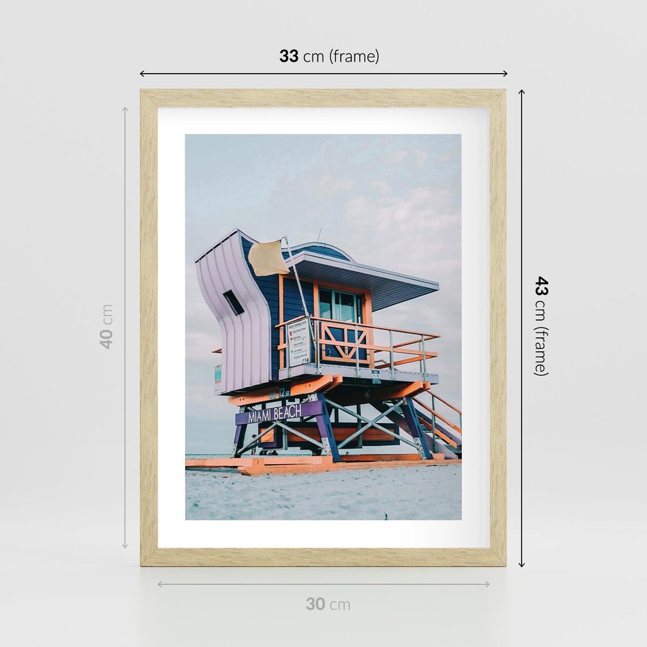 Plakat w ramie 30x40 - Plażowa Kolorystyka: Budka Ratownika w Pastelach - pastelowa budka ratownika, plaża Miami - rama drewno