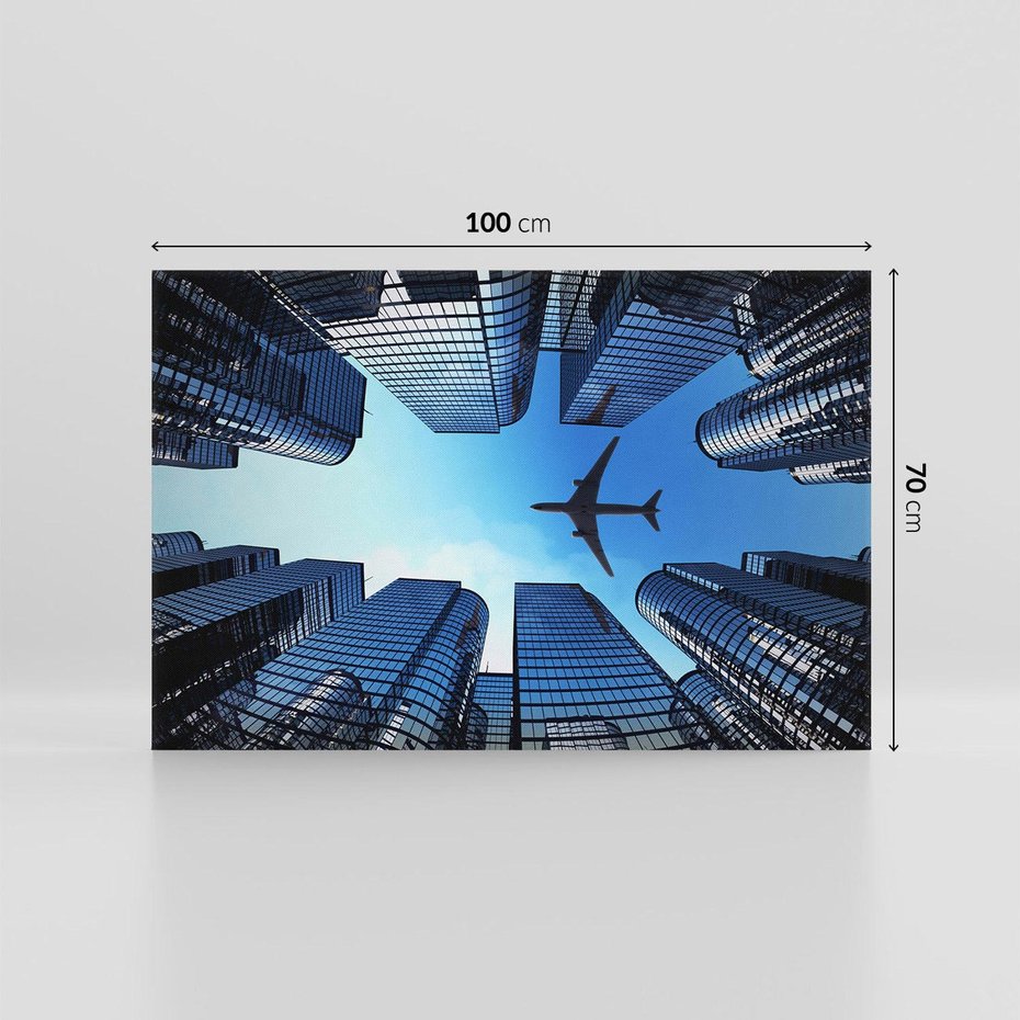 Obraz na płótnie 100x70 - Miasto o niezwykłym widoku - latające samoloty - miasto, samolot