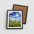 Plakat w ramie 40x50 - Niebiańska łąka pełna kwiatów - łąka, niebo - rama czarna