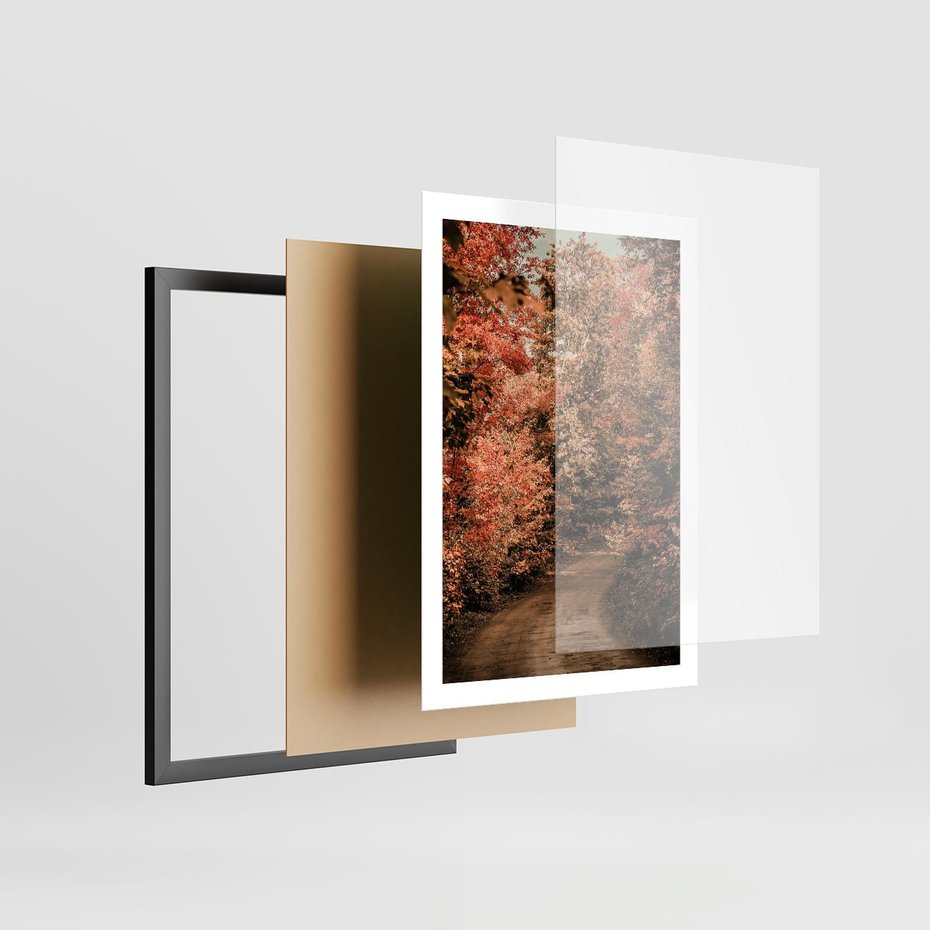 Plakat w ramie 50x70 - Obraz przedstawia jesienne drzewa i czerwone liście na ścieżce w lesie. Ta sceneria doskonale oddaje urok i kolorystykę jesieni w lesie. - las, jesień - rama czarna
