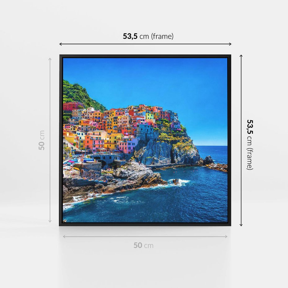 Obraz w ramie 50x50 - Barwne Wybrzeże - nadmorskie miasto na klifie, kolorowe tęczowe budynki - rama czarna