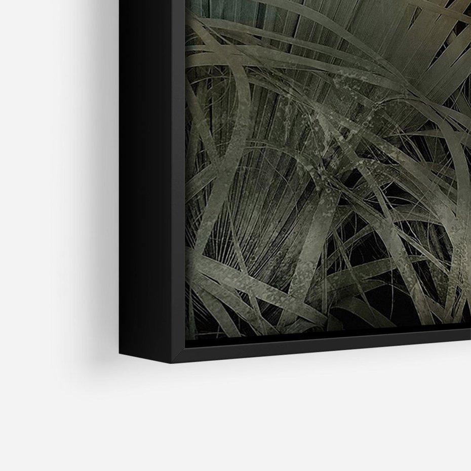 Obraz w ramie 70x100 - Światło w mroku duszy - liście traw, mroczny klimat - rama czarna
