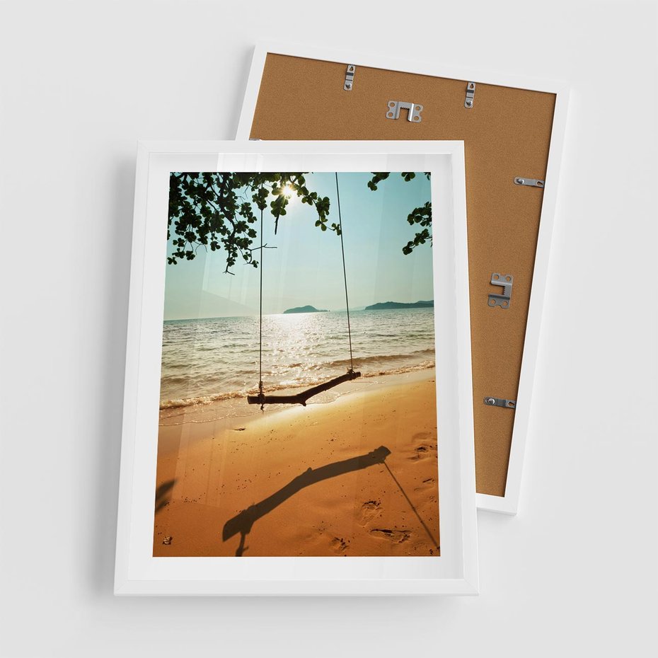 Plakat w ramie 50x70 - Tropikalna plaża i huśtawka - plaża, tropiki - rama biała