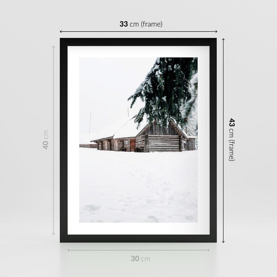 Plakat w ramie 30x40 - Zimowy Azyl - domek w górach, śnieg - rama czarna