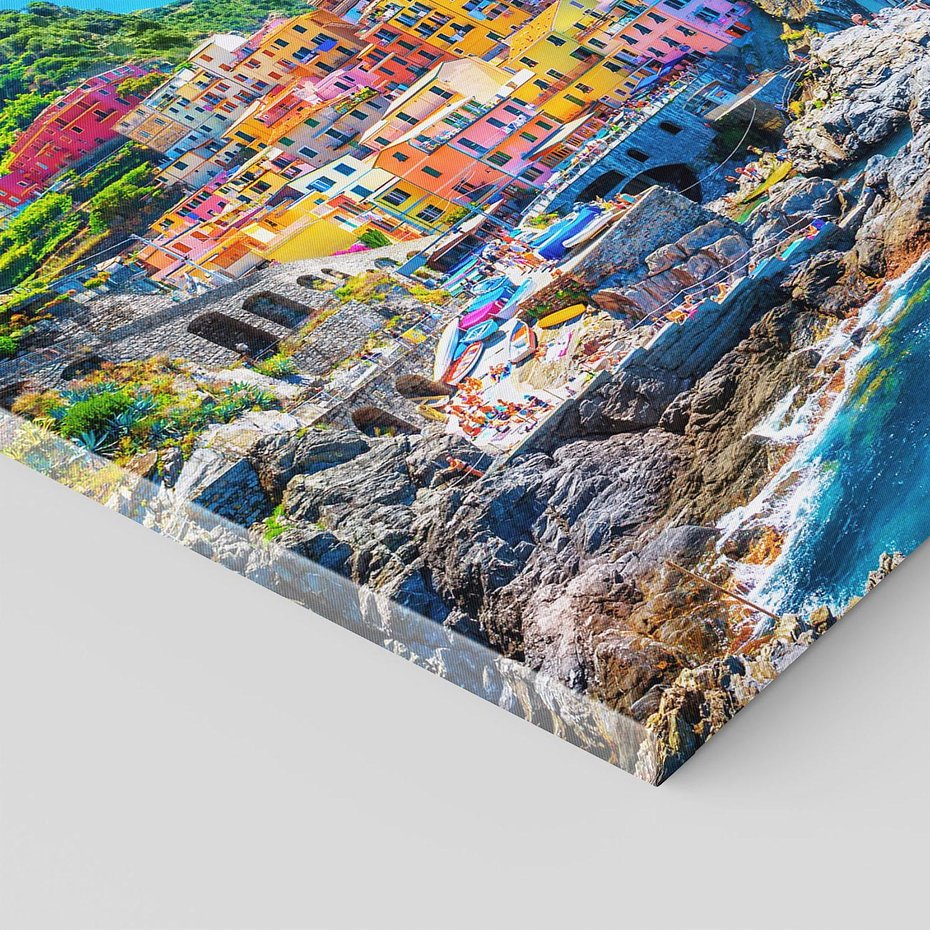 Obraz na płótnie 70x50 - Barwne Wybrzeże - nadmorskie miasto na klifie, kolorowe tęczowe budynki