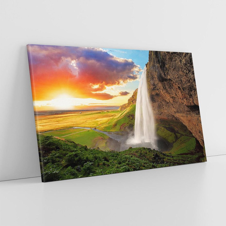 Obraz na płótnie 70x50 - Zachód słońca nad islandzkim wodospadem - Islandia, wodospad