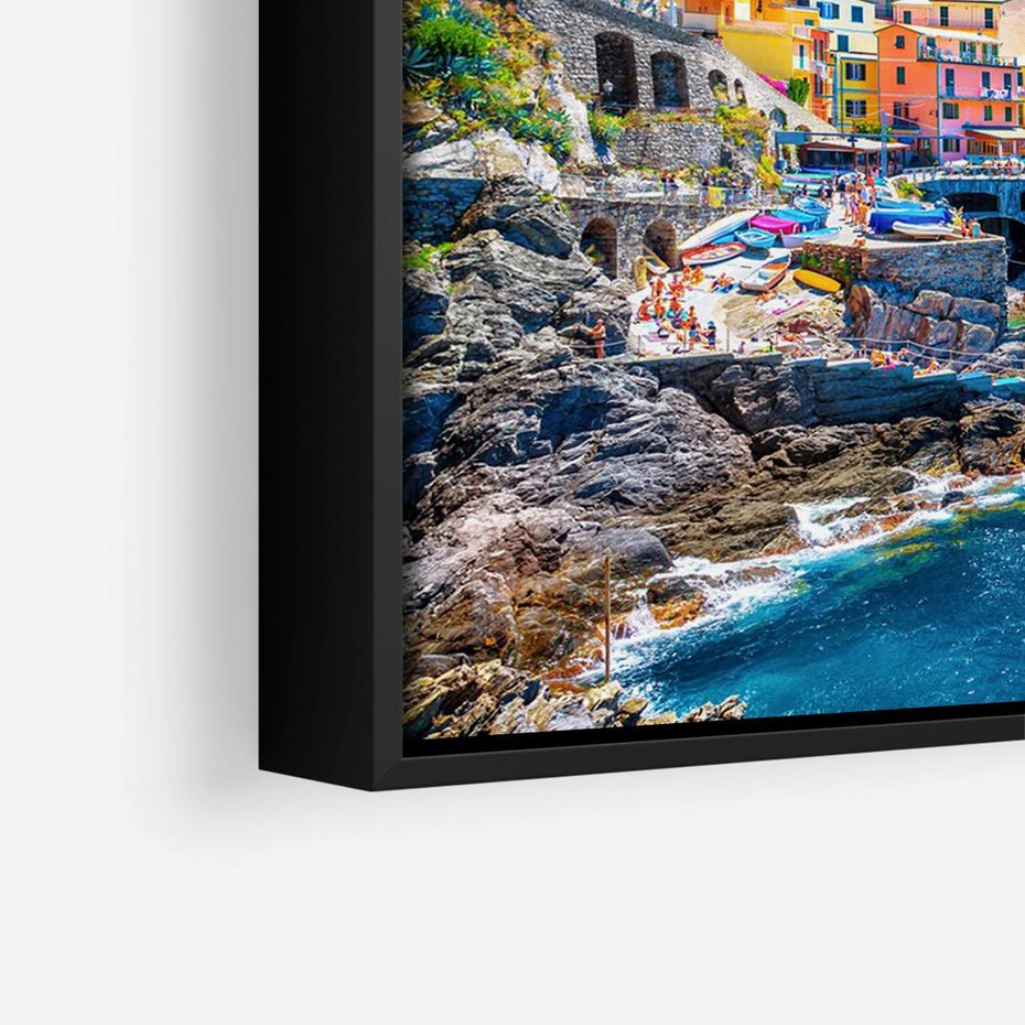 Obraz w ramie 100x70 - Barwne Wybrzeże - nadmorskie miasto na klifie, kolorowe tęczowe budynki - rama czarna