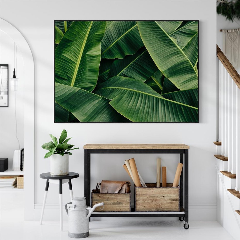 Obraz w ramie 100x70 - Zaklęta roślinna ekspresja - liście bananowca, gęsto ułożone - rama czarna
