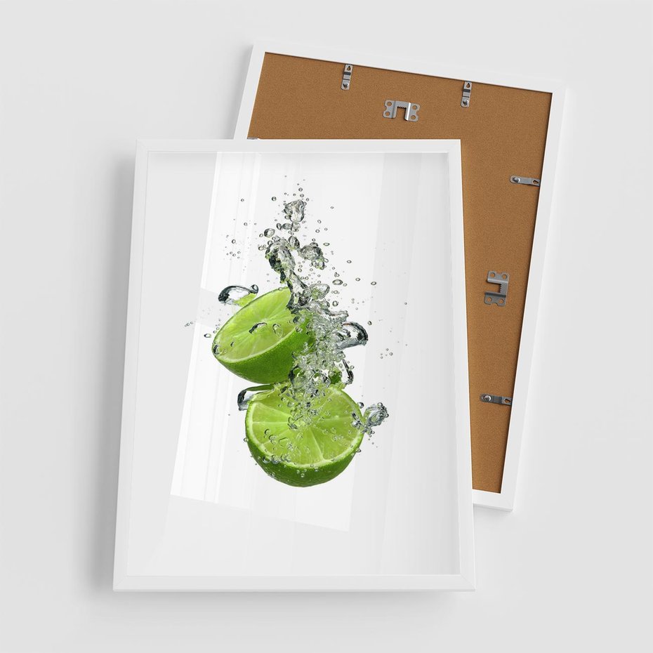 Plakat w ramie 50x70 - Kuchenne limonki na stole - limonki, kuchnia - rama biała