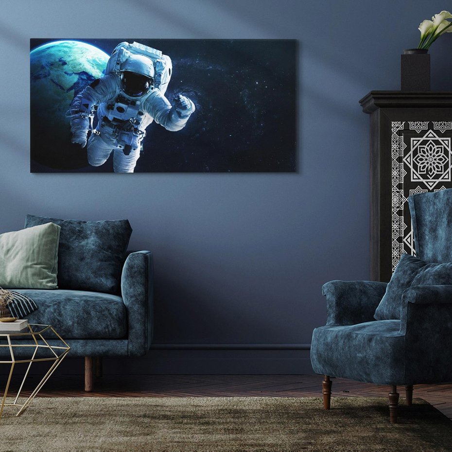Obraz na płótnie 120x60 - kosmiczna podróż - kosmonauta, ziemia