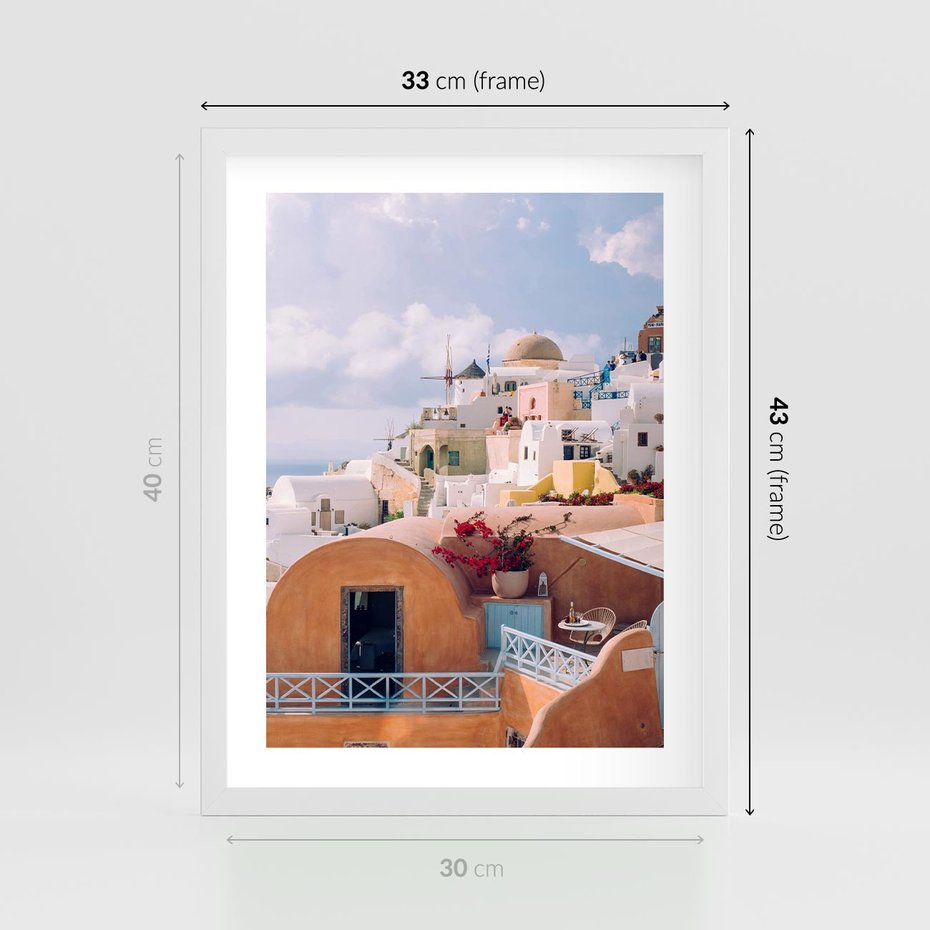 Plakat w ramie 30x40 - Błękit Morza i Białe Domki - Santorini, wyspa - rama biała