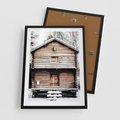 Plakat w ramie 50x70 - Śnieżny Ustronny Raj - domek w górach, śnieg - rama czarna