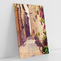 Obraz na płótnie 80x120 - Rowerowa przygoda w uliczkach pełnych perspektywy - uliczka, perspektywa