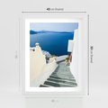 Plakat w ramie 40x50 - Malowniczy urok wyspy - Santorini, schodki - rama biała