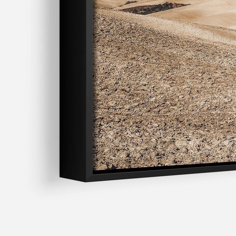 Obraz w ramie 70x50 - Refleksyjny taniec myśli - pustynny krajobraz, odcienie sepii - rama czarna
