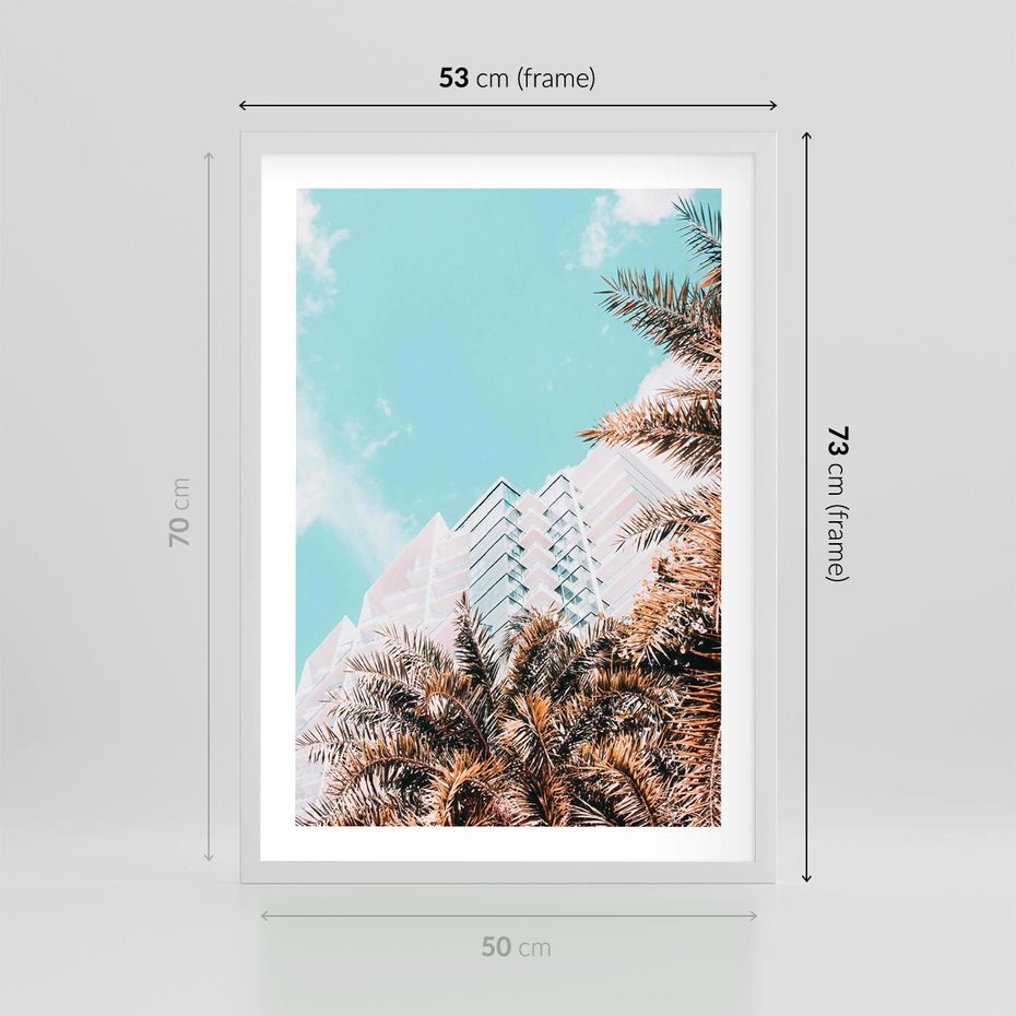 Plakat w ramie 50x70 - Wakacyjny Raj - palmy, wysokie budynki - rama biała