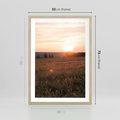 Plakat w ramie 50x70 - Łąka we Wschodzącym Słońcu: Magia Poranka - łąka, krajobraz - rama drewno