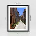 Plakat w ramie 40x50 - Urok uliczki: perspektywa miasta - uliczka, perspektywa - rama czarna