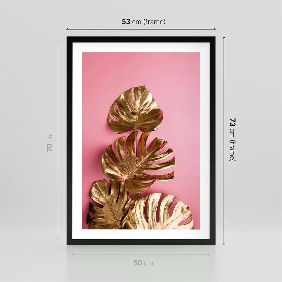 Plakat w ramie 50x70 - Złote Liście Monstery: Delikatność na Różowym Tle - złote liście monstery, różowe tło - rama czarna