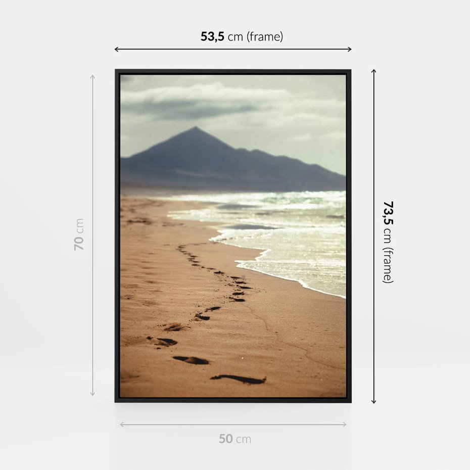 Obraz w ramie 50x70 - Ślady stóp na plaży - plaża, ślady - rama czarna