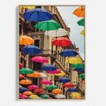 Obraz w ramie 50x70 - Barwna symfonia wyobraźni - fotografia, kolorowe parasolki podwieszone nad ulicą - rama drewno