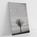 Obraz na płótnie 50x70 - Samotne Drzewo - samotne drzewo w polu, czarno białe zdjęcie