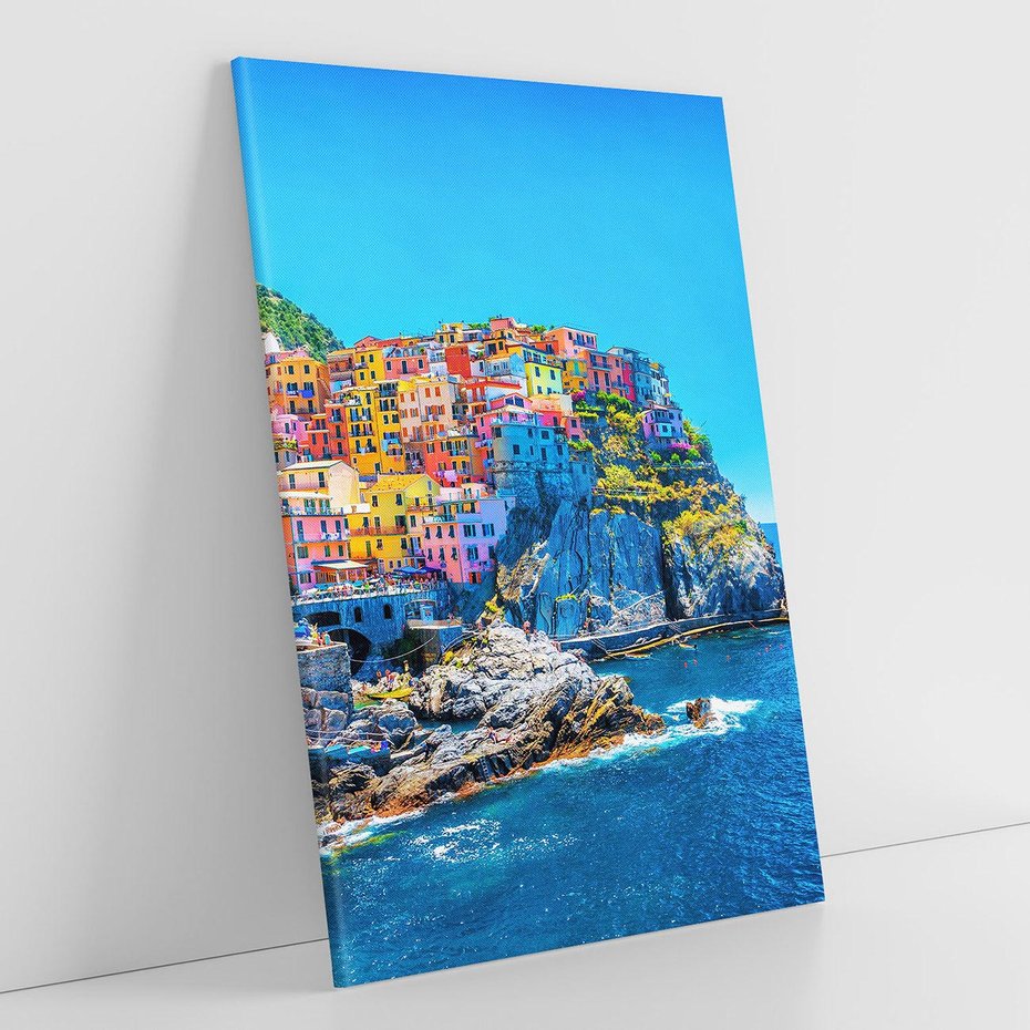 Obraz na płótnie 50x70 - Barwne Wybrzeże - nadmorskie miasto na klifie, kolorowe tęczowe budynki